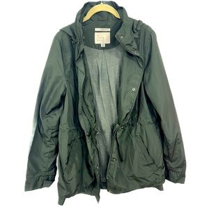 A new day green jacket. Lightly worn like new.